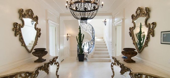 the-entrance-way-has-a-very-unique-chandelier