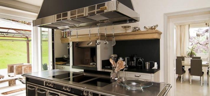 the-gourmet-kitchen-has-a-lot-of-character-compared-to-the-rest-of-the-all-white-rooms-the-black