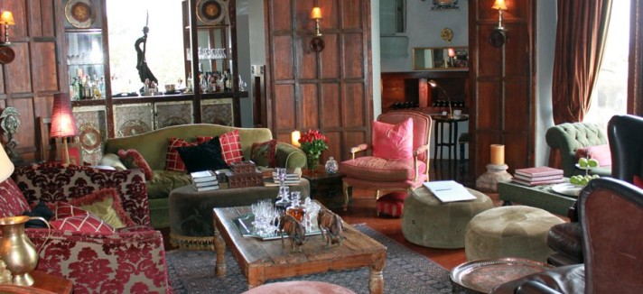 the-sitting-room-in-the-south-camp-lodge-was-opulent-there-were-carved-wooden-panels-brocade-sof