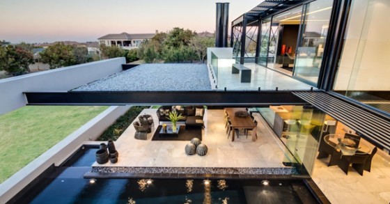 Una villa geometrica con lago privato in sudafrica (fotogallery)