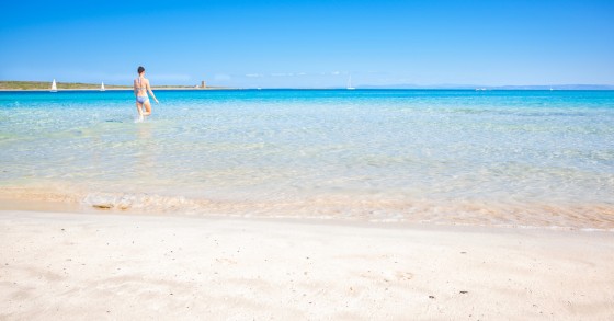 The beach at La Pelosa in Sardinia, Italy is still a wonderful place to go on holiday after Brexit / Flickr