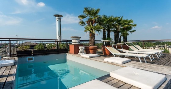This spectacular penthouse is for sale in Monza