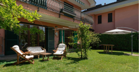 Casa con giardino