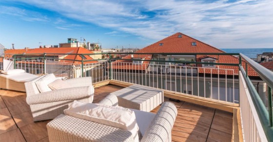 Attici con balcone