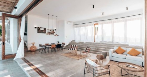 Dentro la casa di Damiano Carrara a Lucca: open space total white
