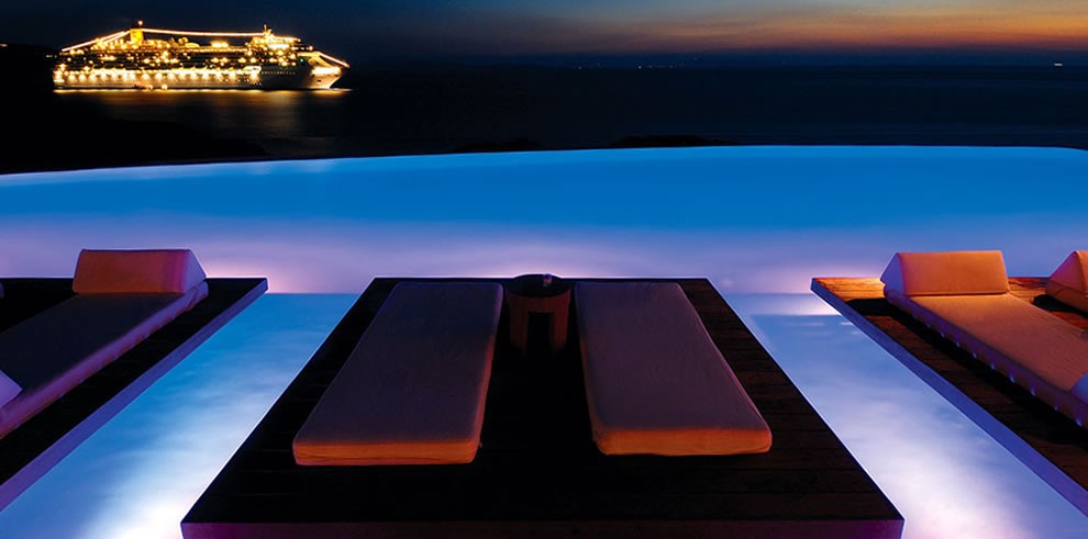 dreaming-the-night-away-infinity-pool-at-night-overlooking-brightly-lit-ship-infinity-pool-22