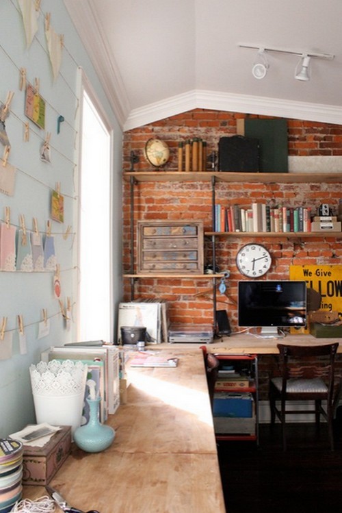 Una parete di mattoni a vista per dare un tocco rustico e accogliente alla casa (fotogallery)