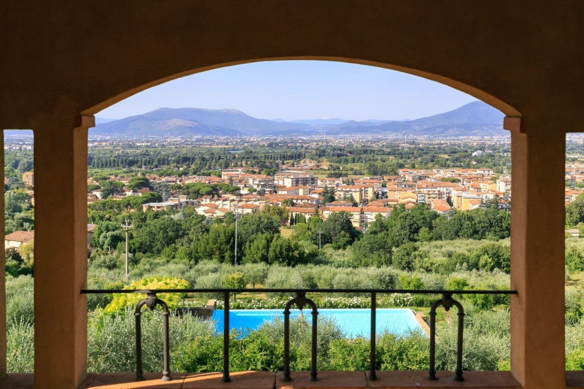 The villa has stunning views of the Tuscan hills