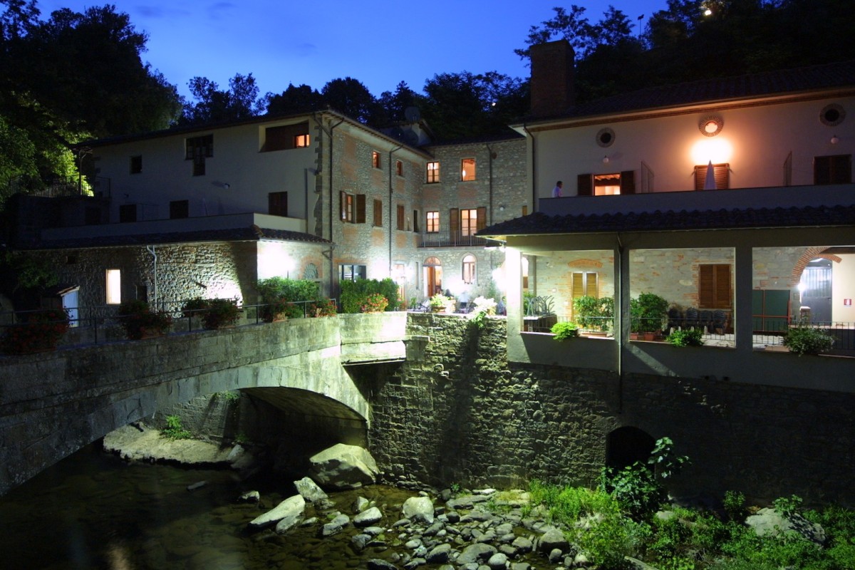 The main buildings lit up at night