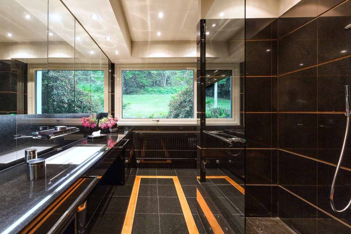 The property has exquisite design features throughout, including the bathrooms