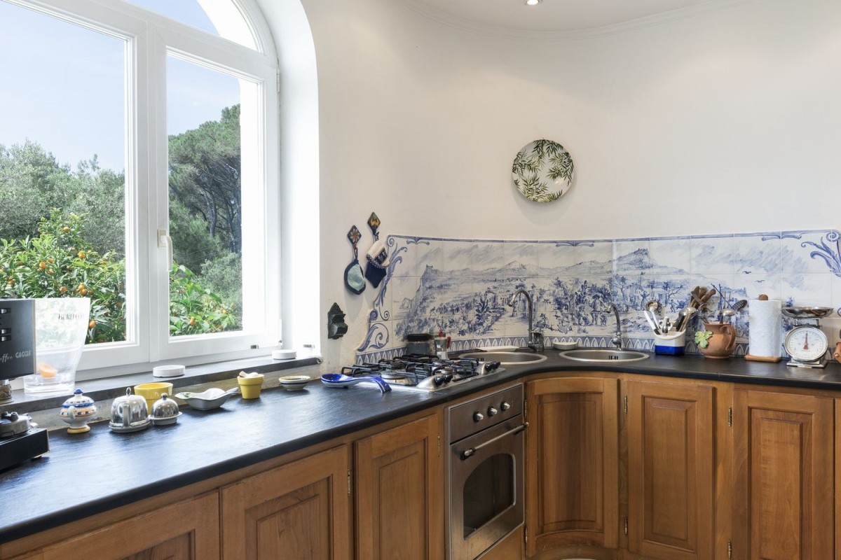 The traditional kitchen with spectacular views and terrace access