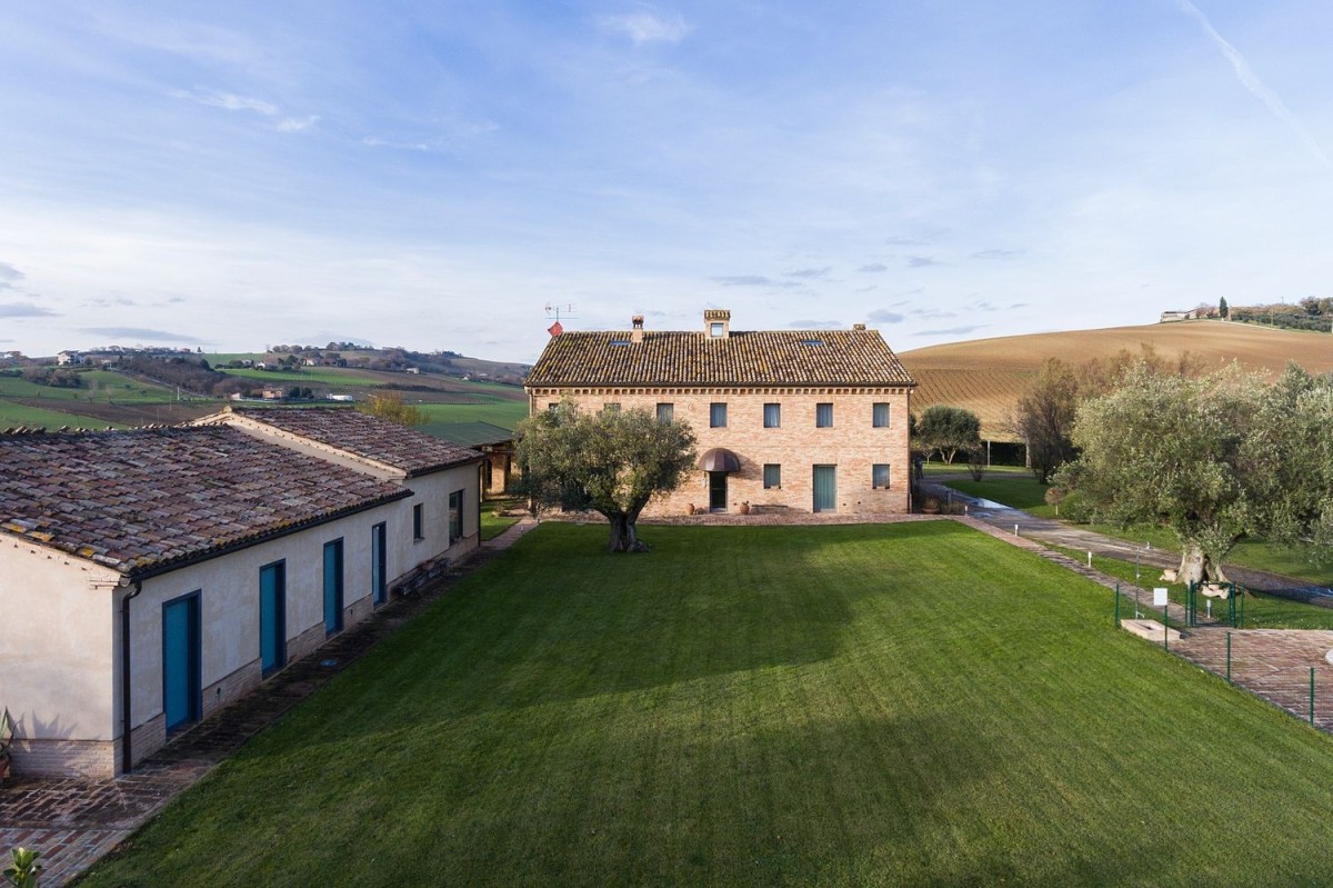 This farmhouse is for sale in Marche, Italy