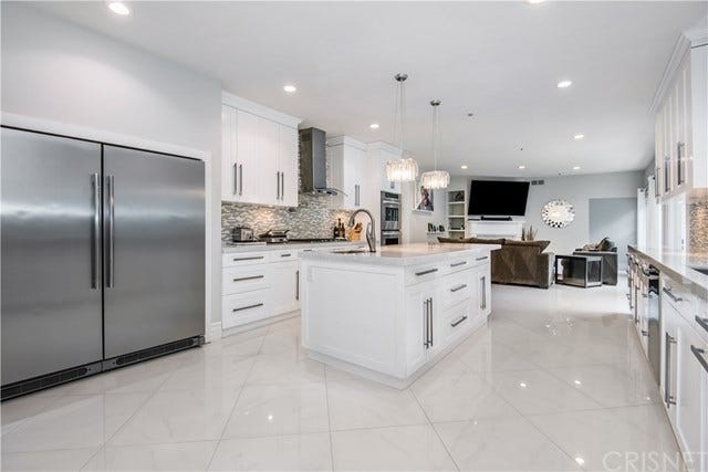 Ampia cucina e doppio frigo