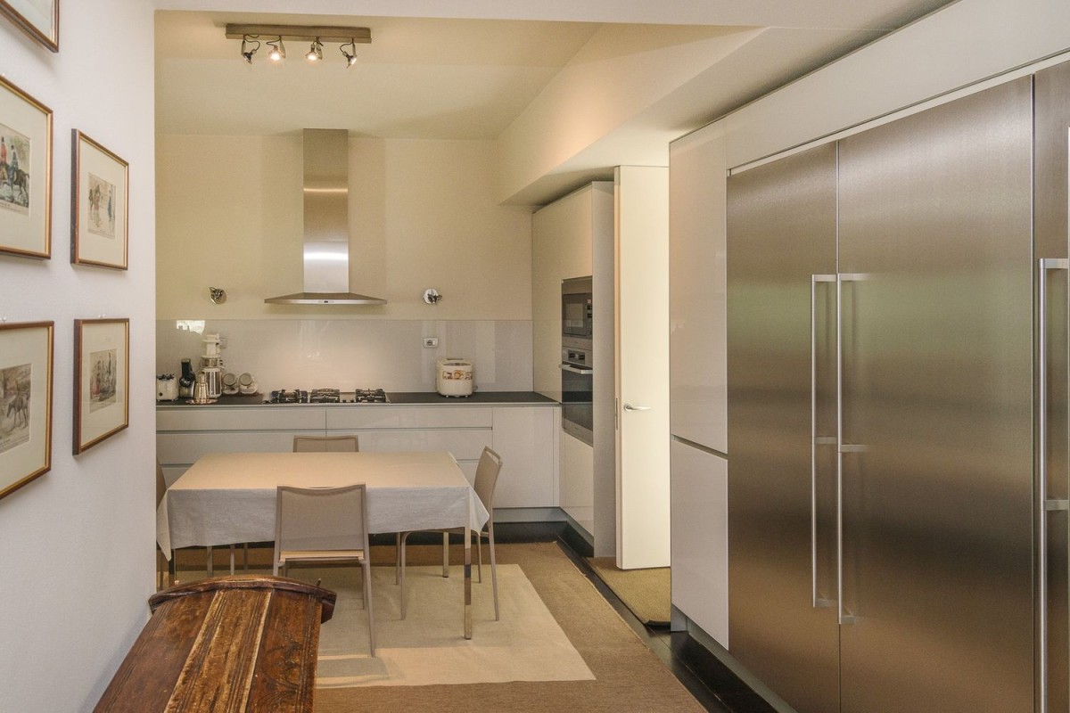 The kitchen is modern and with top of the range appliances