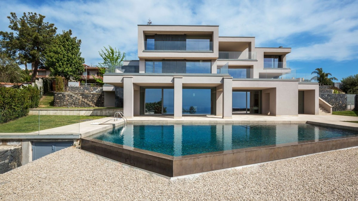 This modern sea view villa is for sale in Italy