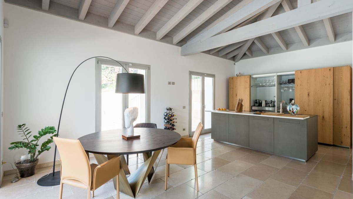 The kitchen and dining area is modern with a minimalist design