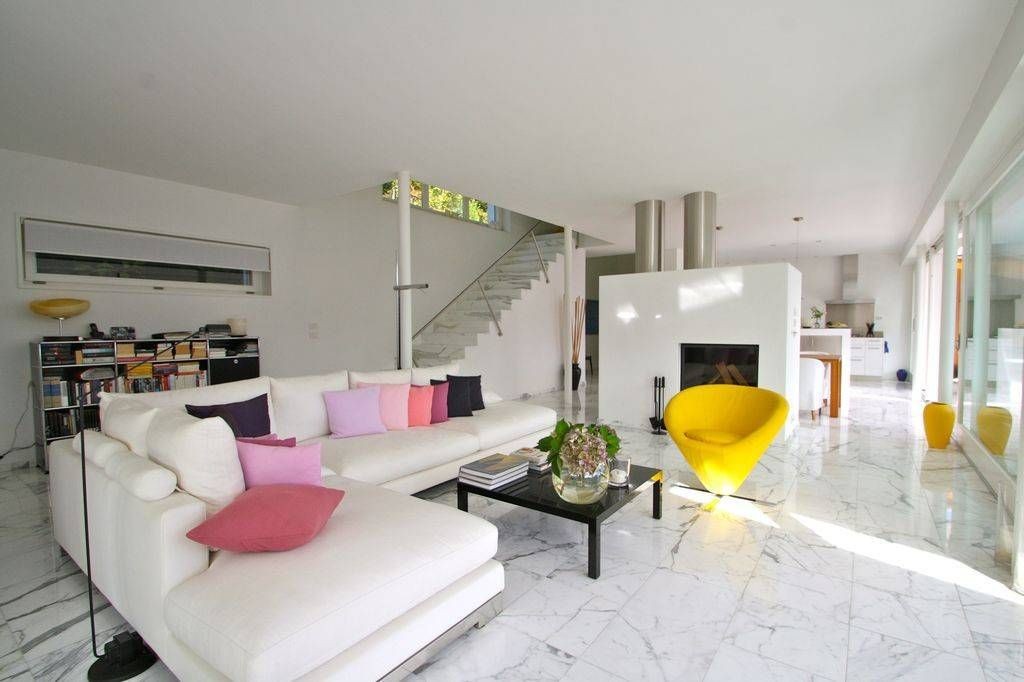 The spacious living area has unique design features The spacious living area has unique design features