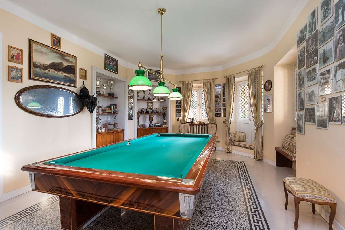 The property has several living areas, one of which is currently home to a games room