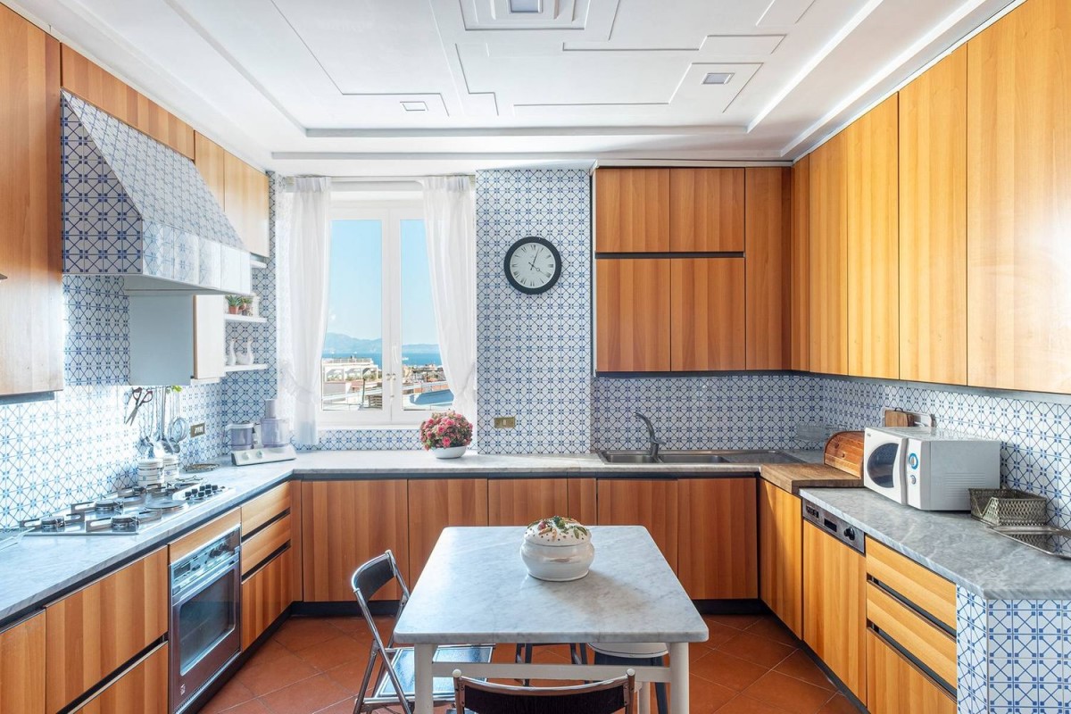 The traditional kitchen is spacious and bright