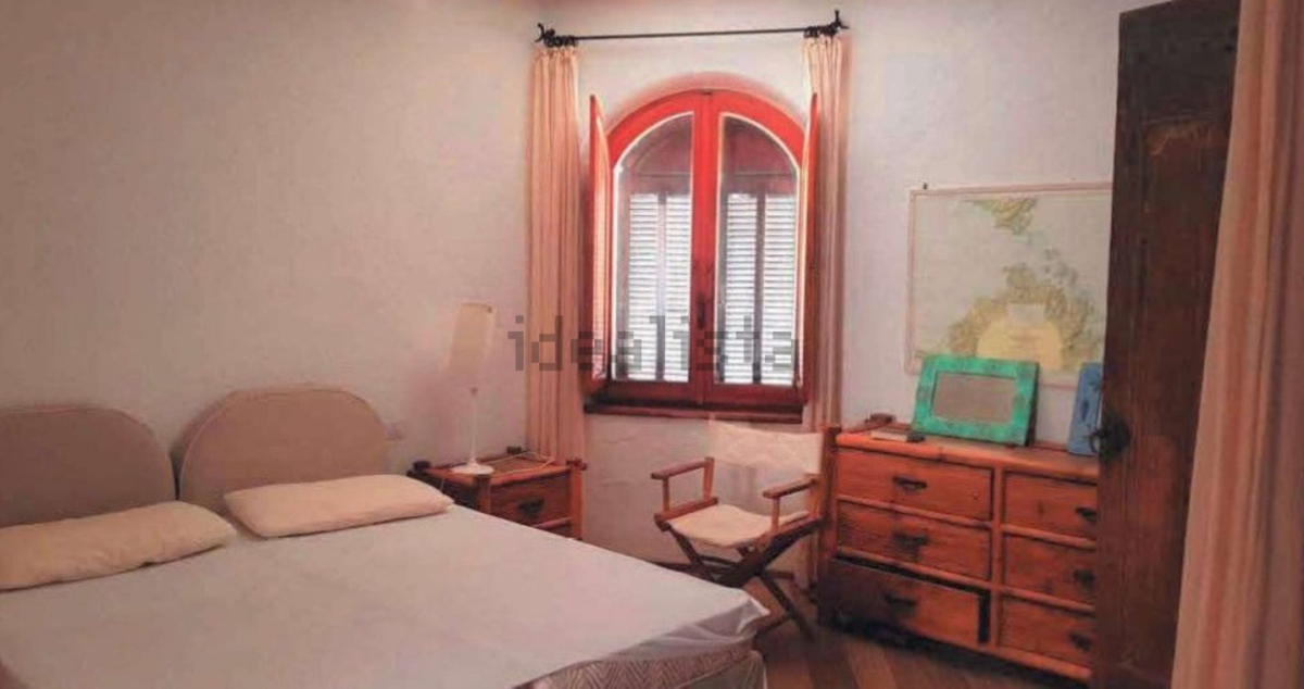 Camera da letto in stile rustico