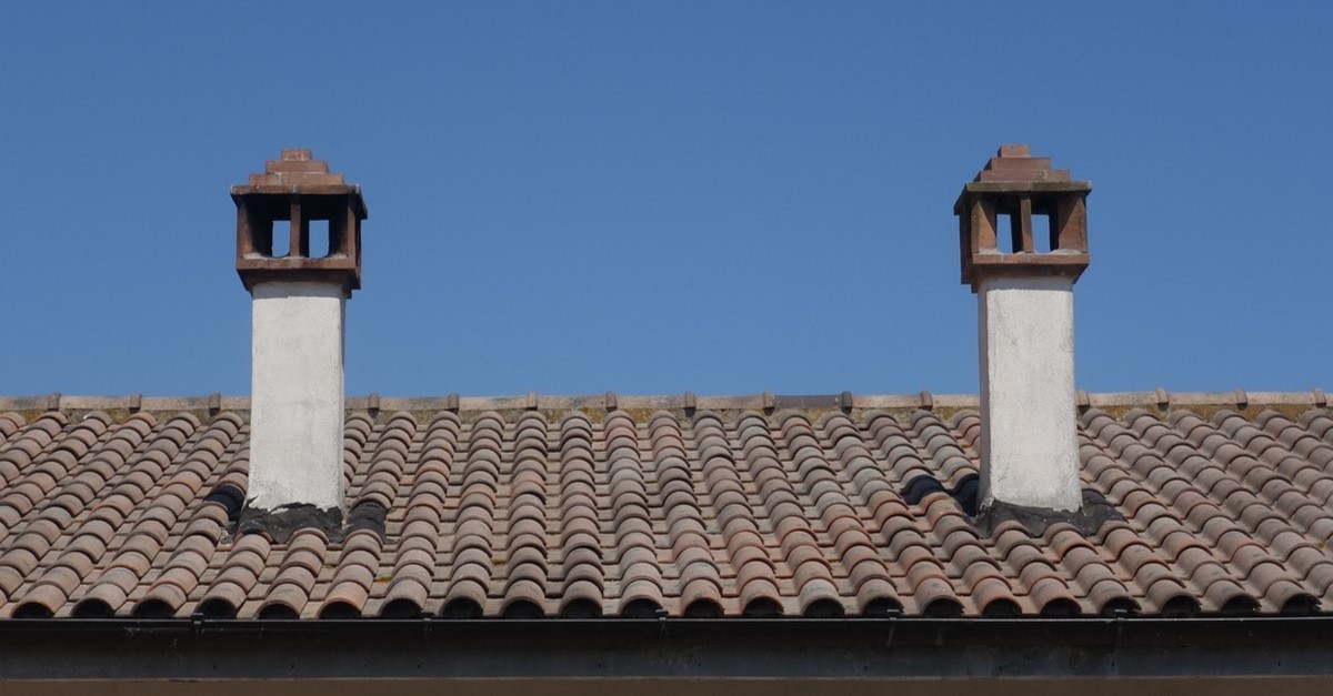 tetto con canna fumaria