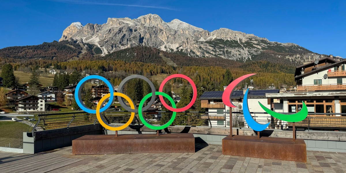 mascotte olimpiadi 2026 