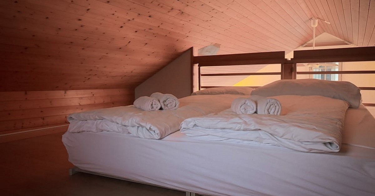 Camera da letto soppalcata