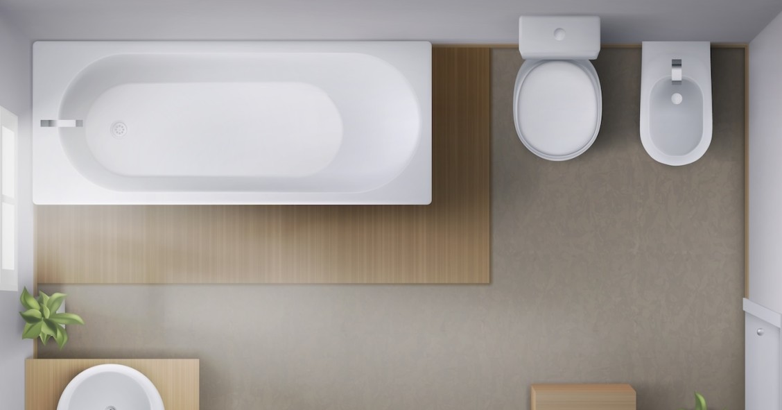 Bagno interno visto dall’alto con vasca, water, bidet, tazza e lavandino in ceramica con specchio