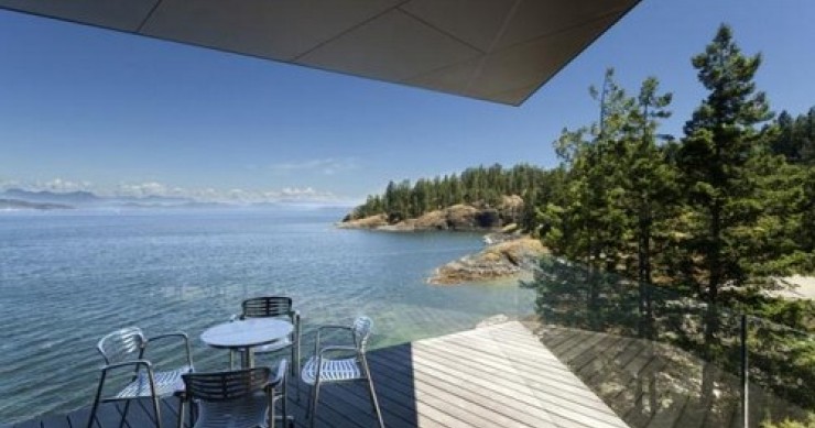 Una villa progettata tra terra e mare su un'isola remota del canada (fotogallery)
