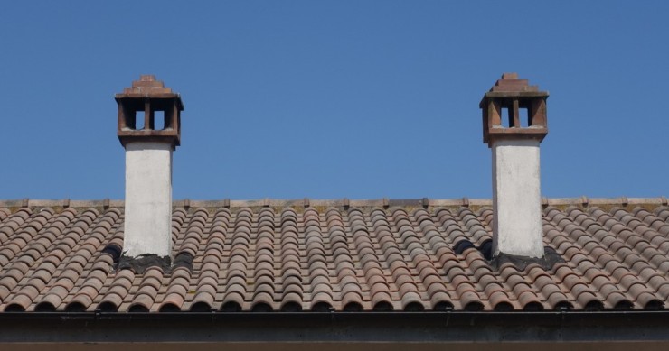 tetto con canna fumaria