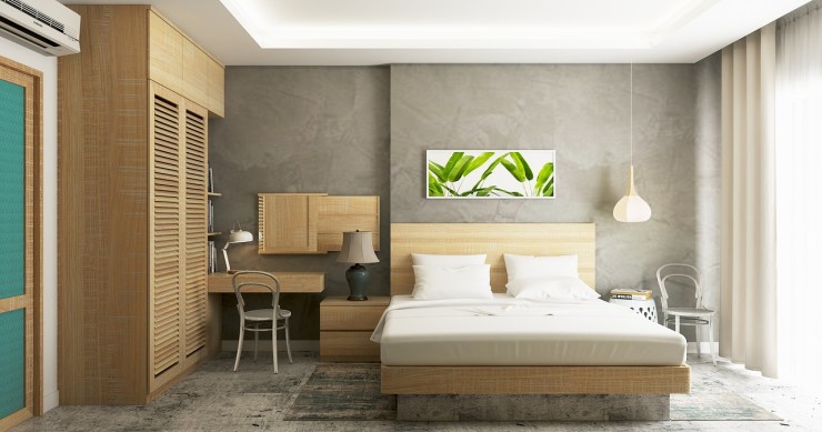 una camera da letto con pavimento in cemento