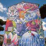 L'arte pubblica per dare nuova vita a un quartiere: a Roma il "progetto SanBa" ha cambiato le facciate di quattro palazzi (foto)
