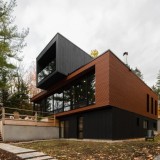 Una casa di campagna prefabbricata e di design