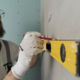 Piastrellista, lavoratore per la ristrutturazione di un appartamento