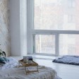 Camera da letto decorata con pittura strutturata